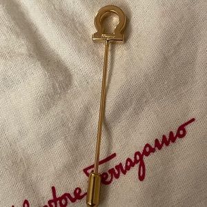 Authentic Salvatore Ferragamo lapel/ hat/ stick pin. Gold tone.No box or bag.New